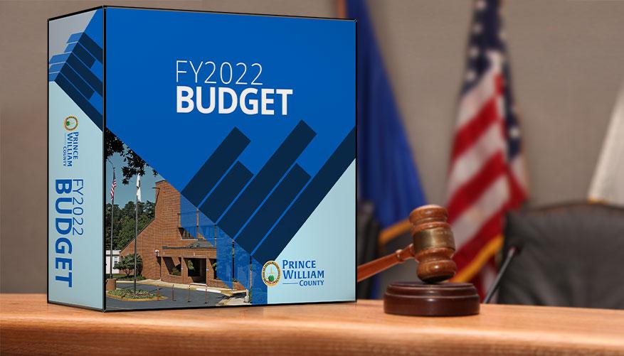 Image of the FY2022 Budget book on the dais